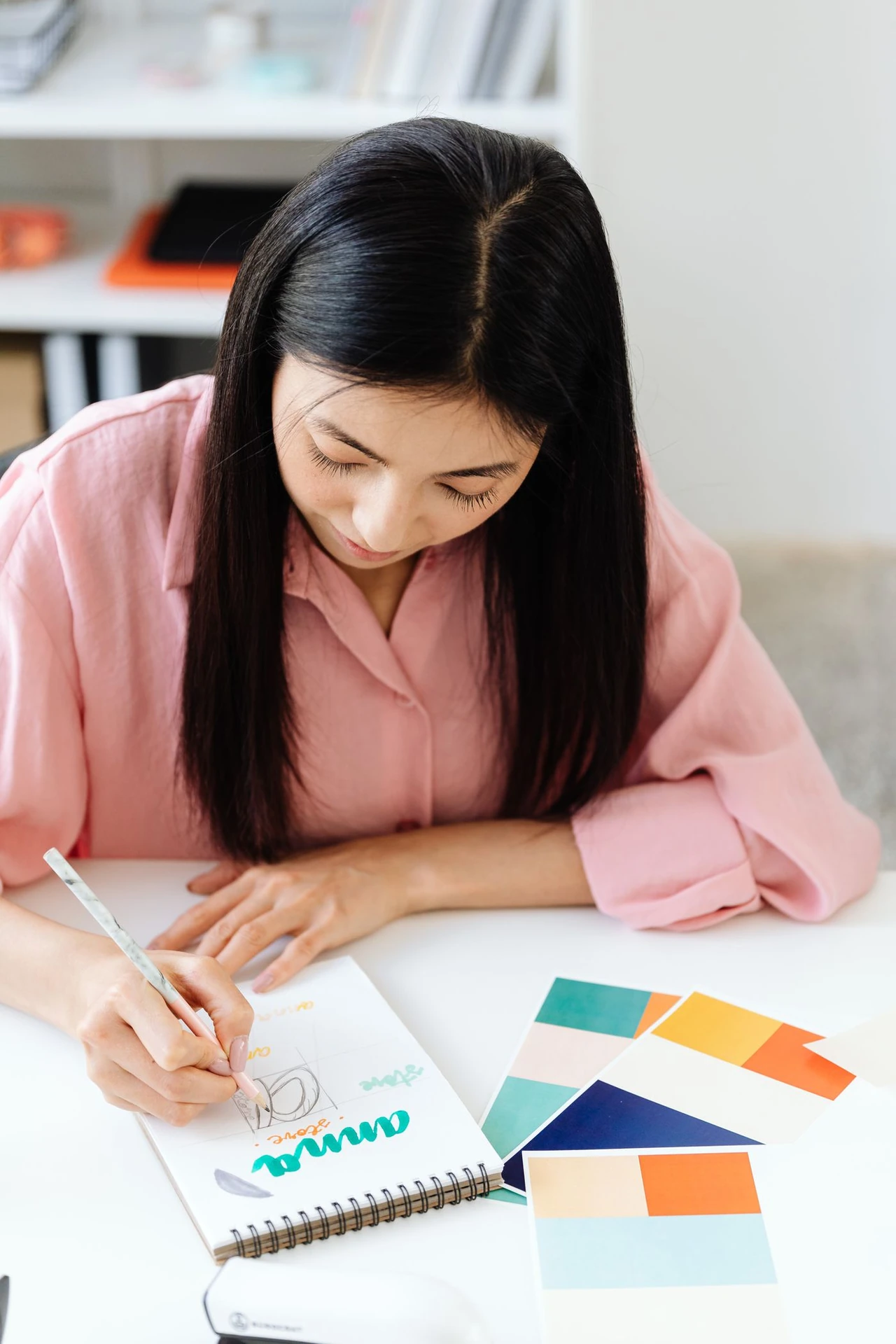 Designer working with color samples — illustrative context