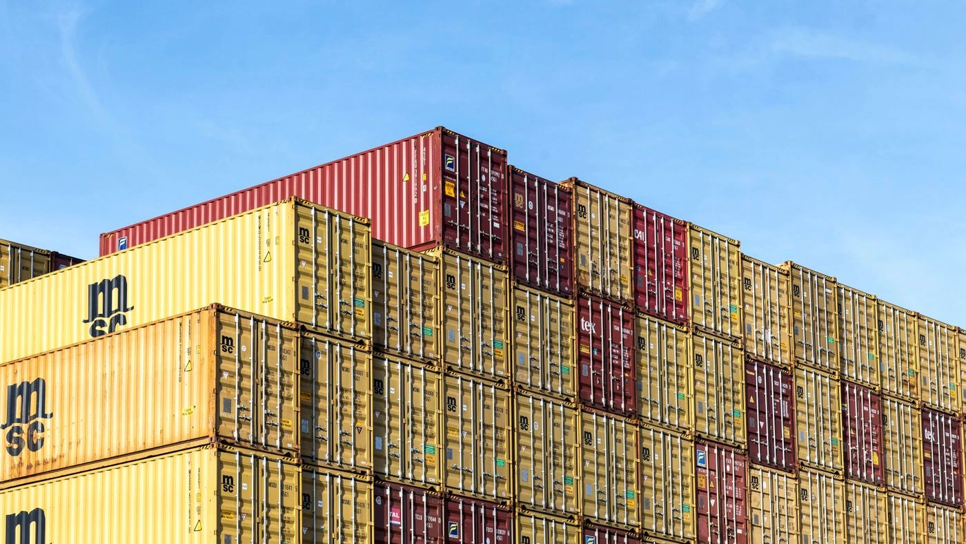 Cargo containers and global shipping — illustrative context