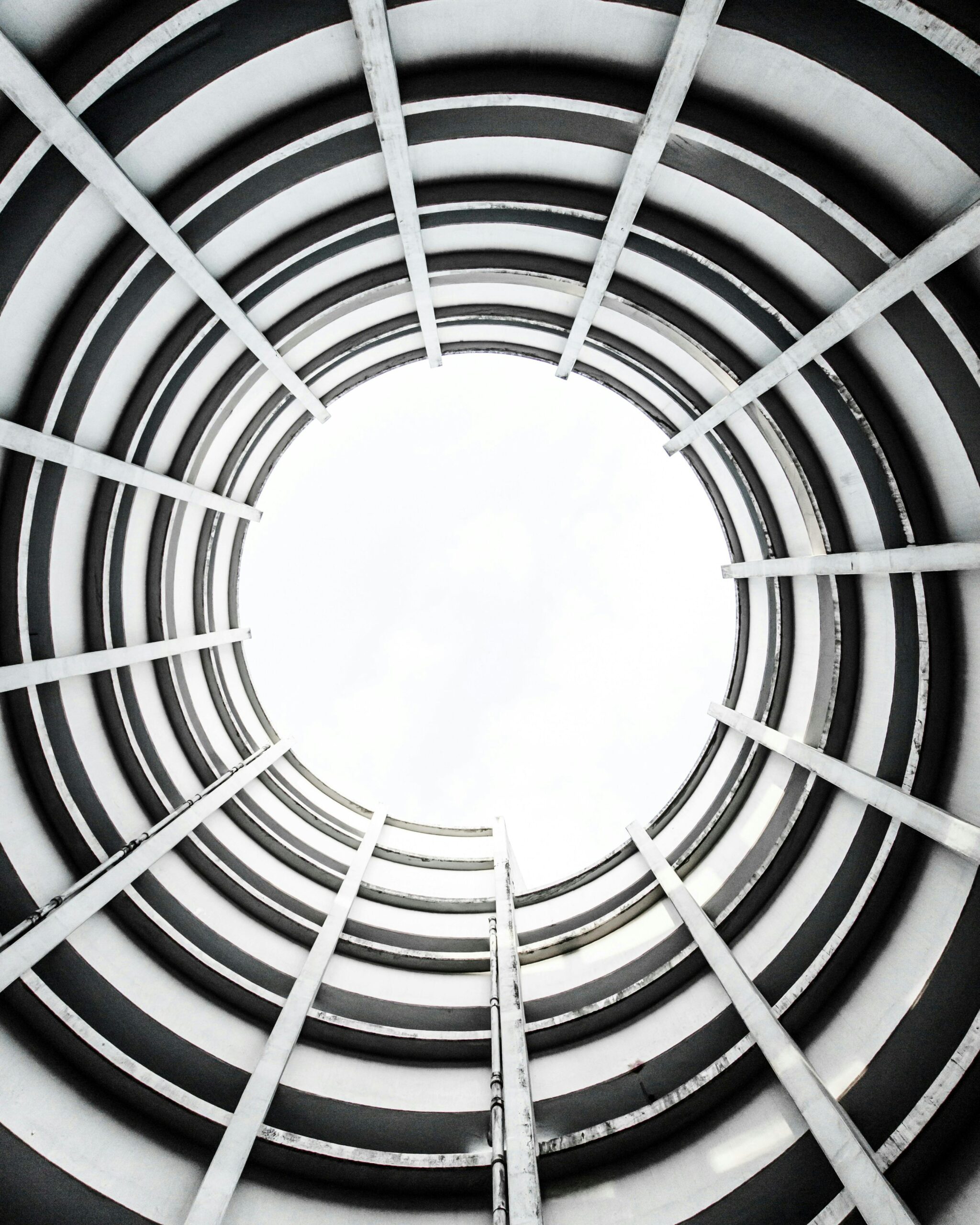 Abstract view of circular architecture looking up towards the sky.